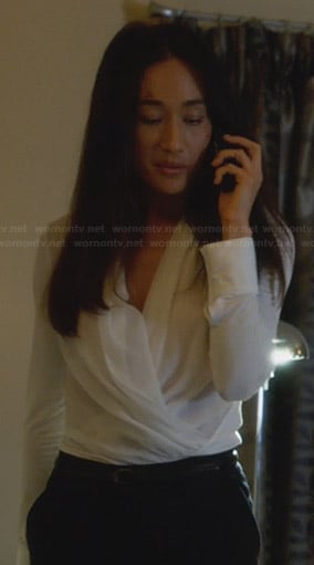 Nikita's white wrap blouse on Nikita