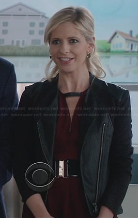 Sydney's burgundy keyhole dress with leather detail and leather jacket on The Crazy Ones
