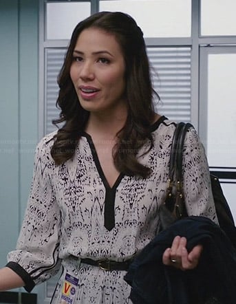 Angela's white printed dress with black trim on Bones