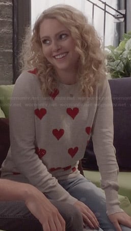 Carrie's beige and red heart sweater and polka dot jeans on The Carrie Diaries