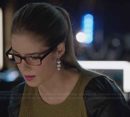 Felicity's knit and leather peplum top and silver shape earrings on Arrow