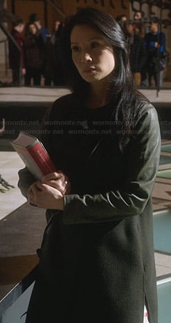 Joan's green coat with leather sleeves on Elementary