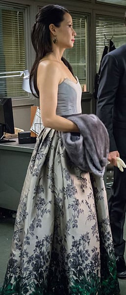 Joan's silver and green floral ombre gown on Elementary