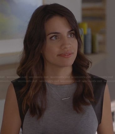 Meg's grey leather sleeve top on Trophy Wife