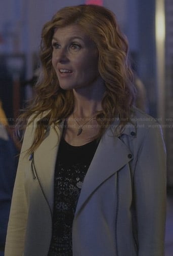 Rayna's floral skull tee and white leather moto jacket on Nashville