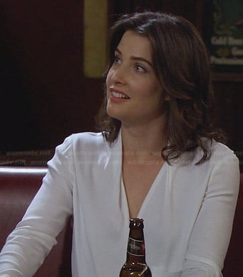 Robin's white wrap blouse with buckle detail on How I Met Your Mother