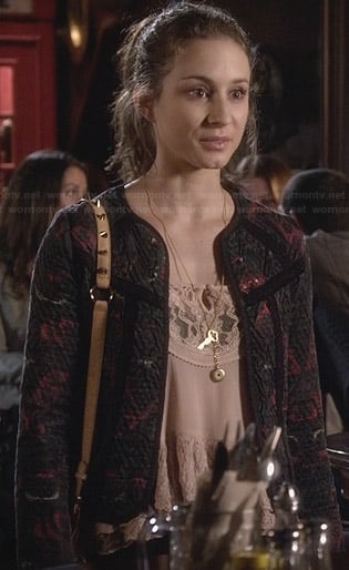 Spencer's peach lace top and black and red jacket on Pretty Little Liars