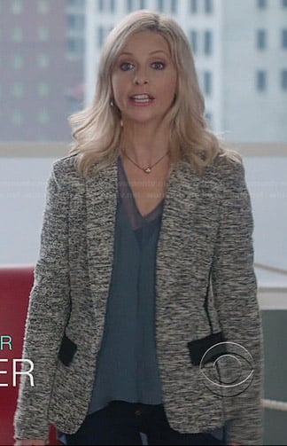 Sydney's blue v-neck blouse and black and white tweed jacket on The Crazy Ones