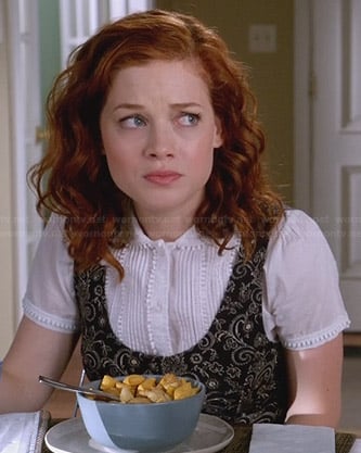 Tessa's black floral dress and white shirt on Suburgatory