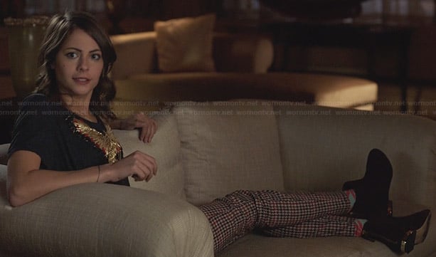 Thea's houndstooth tousers, gold embroidered butterfly top and gold heel boots on Arrow