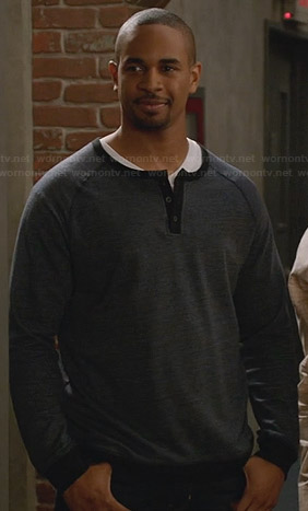Coach's grey henley sweater with black trim on New Girl