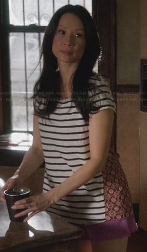 Joan's striped tee with patterned back on Elementary