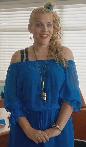 Laurie's blue off-shoulder dress and horn necklace on Cougar Town