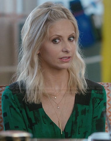 Sydney's green and black printed wrap dress on The Crazy Ones