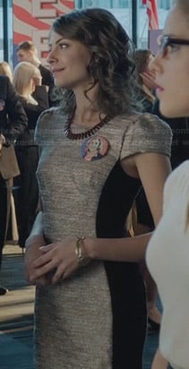 Thea's grey cap sleeve dress with black side panels on Arrow