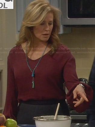 Vanessa's red flared sleeve blouse on Last Man Standing
