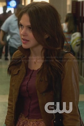 Emery's tan jacket with leather sleeves on Star-Crossed
