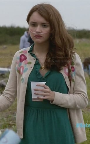 Emma's green ruffle front dress and floral cardigan on Bates Motel
