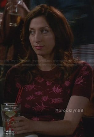 Gina's red dress with pink bug print on Brooklyn Nine-Nine