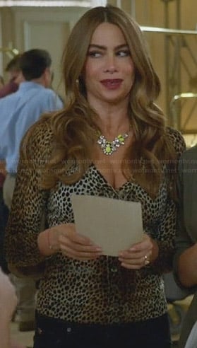 Gloria's leopard print cardigan and yellow crystal necklace on Modern Family