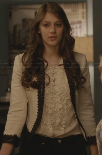 Layla's white jacket with black embroidered trim on Nashville