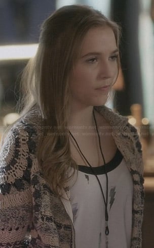 Maddie's crochet jacket and lightning bolt print top on Nashville