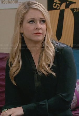 Mel's green blouse with leather shoulders and zip front on Melissa and Joey