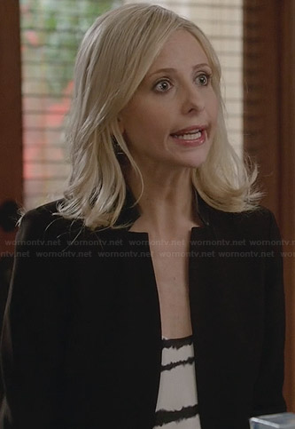 Sydney's black and white striped top and leather collar jacket on The Crazy Ones
