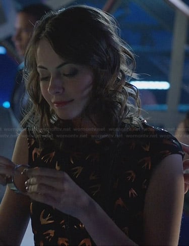 Thea's black and gold bird print dress on Arrow