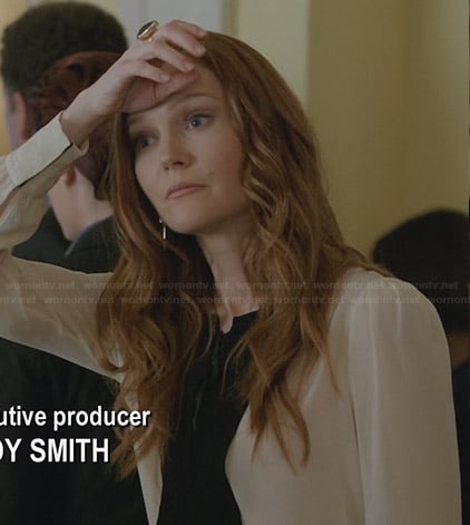 Abby's cream blouse with black front on Scandal