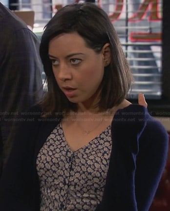 April's blue floral button front dress on Parks and Recreation