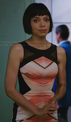 Camille's orange dress with black cross front on Bones