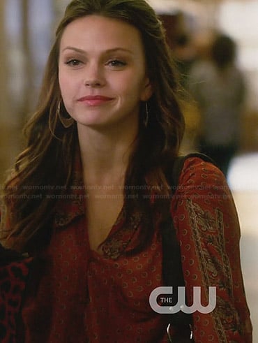 Emery's orange printed shirt on Star-Crossed