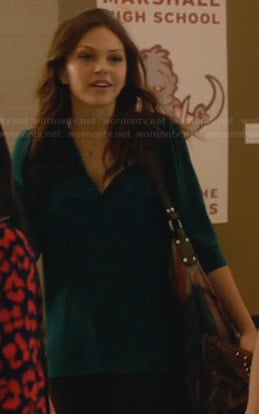 Emery's teal henley shirt on Star-Crossed