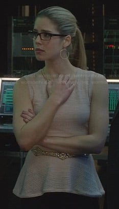 Felicity's light pink perforated peplum top on Arrow