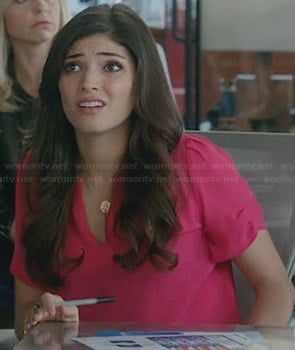 Lauren's pink v-neck blouse with ruched sleeves on The Crazy Ones