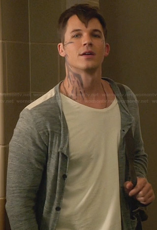 Roman's grey cardigan with white back on Star-Crossed