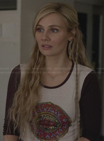 Scarlett's cropped burgundy baseball tee with circle graphic on Nashville