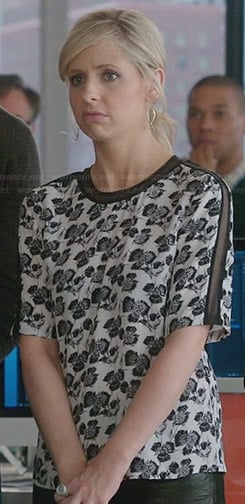 Sydney's black and white printed top with mesh inserts on The Crazy Ones