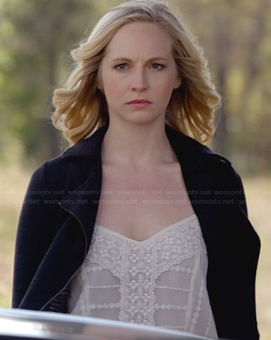 Caroline's white embroidered top and black moto jacket on The Vampire Diaries