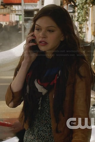 Emery's printed top, brown leather sleeve jacket and striped scarf on Star-Crossed