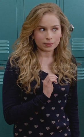 Lisa's navy blue heart print sweater on Suburgatory