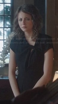 Thea's black cutout bow dress on Arrow