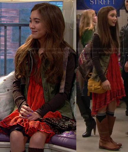 Riley's orange printed dress, green jacket, tan boots and embellished backpack on Girl Meets World