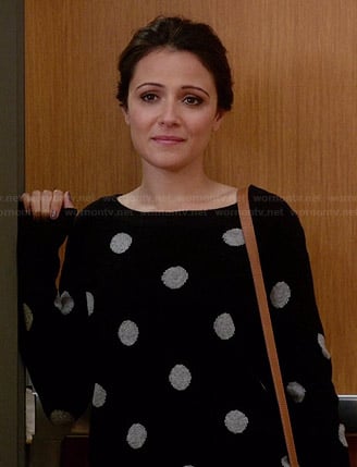 April's black and white polka dot sweater on Chasing Life