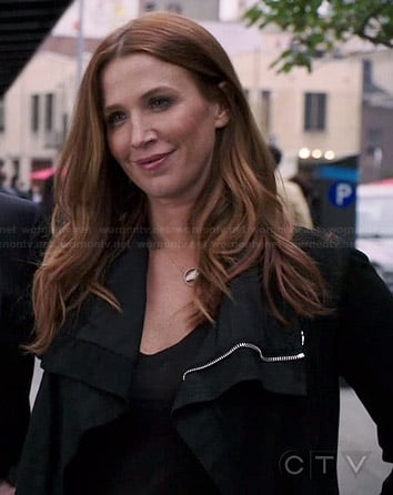 Carrie's black leather jacket on Unforgettable
