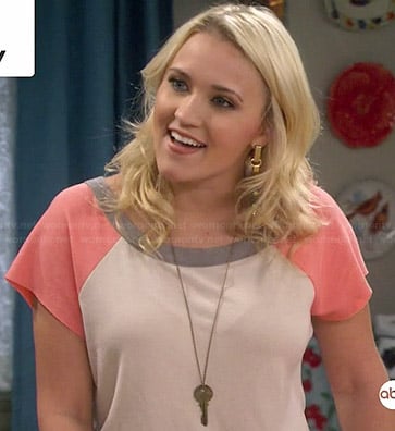 Gabi's white and peach baseball top on Young and Hungry