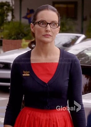 Ginny's red pleated dress and cropped navy cardigan on Bad Teacher