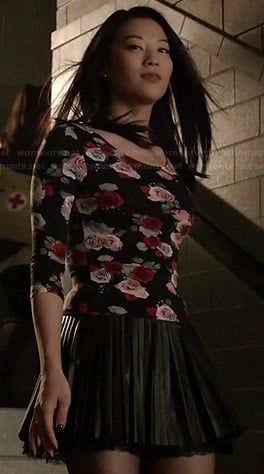 Kira's pleated leather skirt and rose print top on Teen Wolf