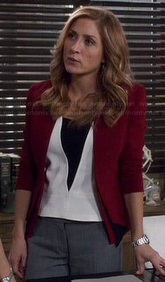 Maura's white top with black triangle and burgundy blazer on Rizzoli and Isles